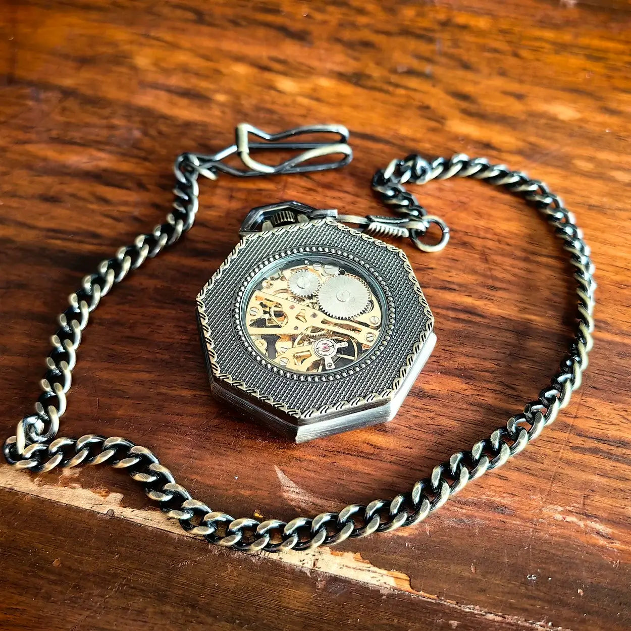 Oktagonale, hohle mechanische Taschenuhr aus Bronze