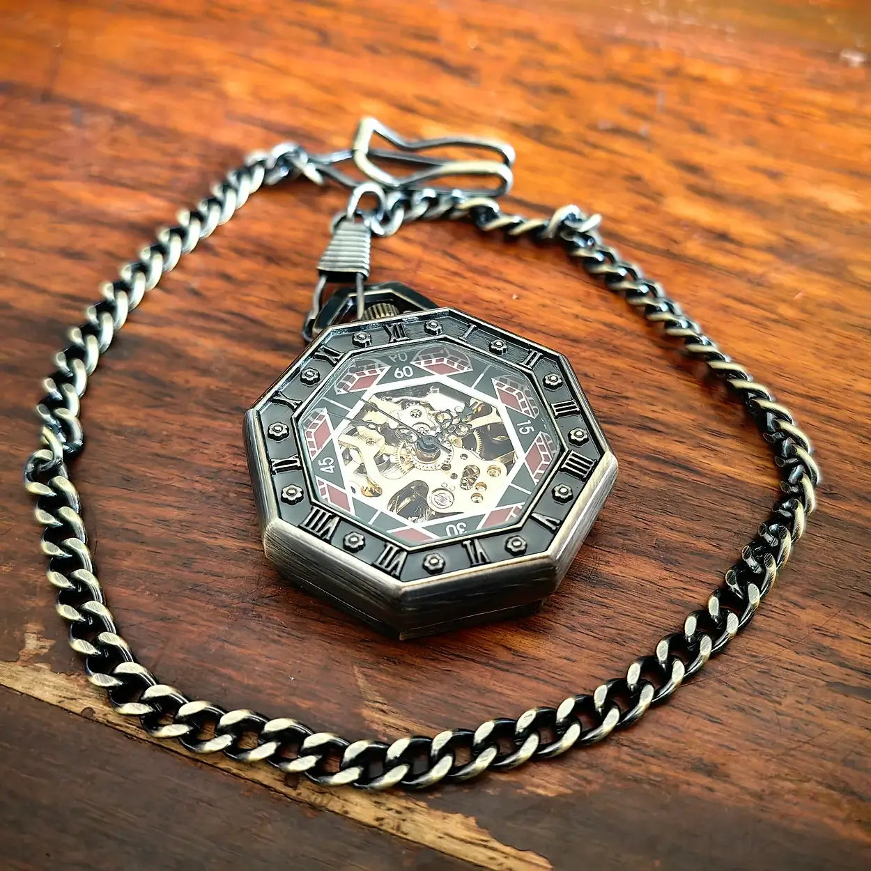 Oktagonale, hohle mechanische Taschenuhr aus Bronze