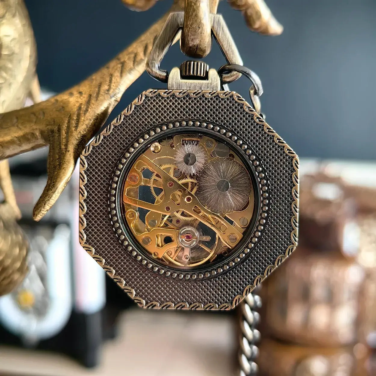 Oktagonale, hohle mechanische Taschenuhr aus Bronze